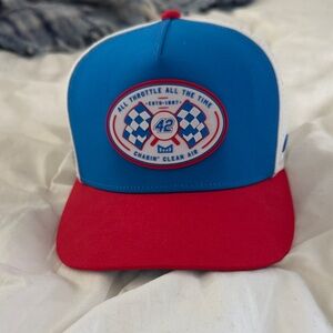 Melin Brand Blue and Red Racing Patch Trucker Hat